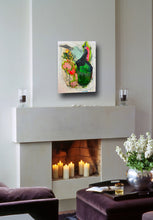 floral painting displayed over fireplace with candles