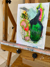 floral painting displayed on easel