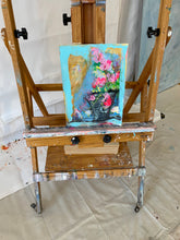 painting being displayed on easel by artist cheryl wasilow