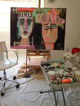 Whimsical figurative painting of 3 abstract heads on large horizontal canvas in art studio by cheryl wasilow 