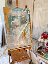 blue painting on easel in art studio by cheryl wasilow