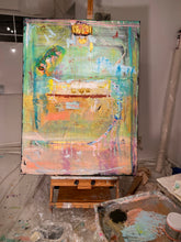 turquoise, green and orang and pink abstract painting on easel by artist Cheryl Wasilow