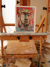 Red and blue painting of abstract native face
